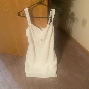 White dress, with middle cut out.
